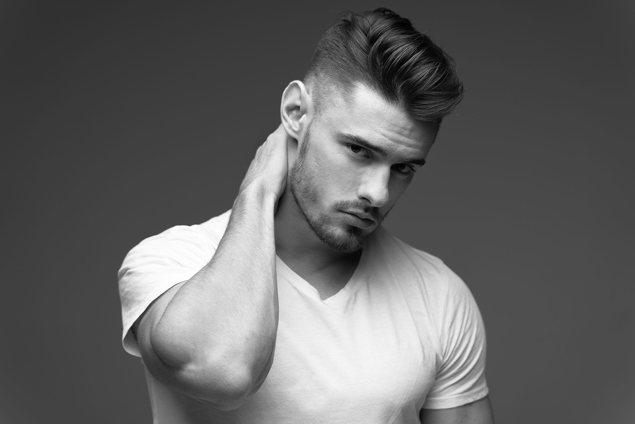 Black and white portrait of a young man.